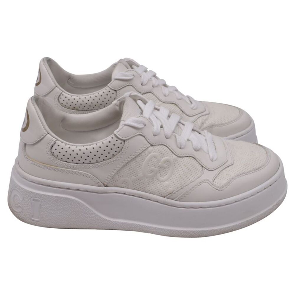 Gucci GG Embossed Low-Top Sneakers in White Leather